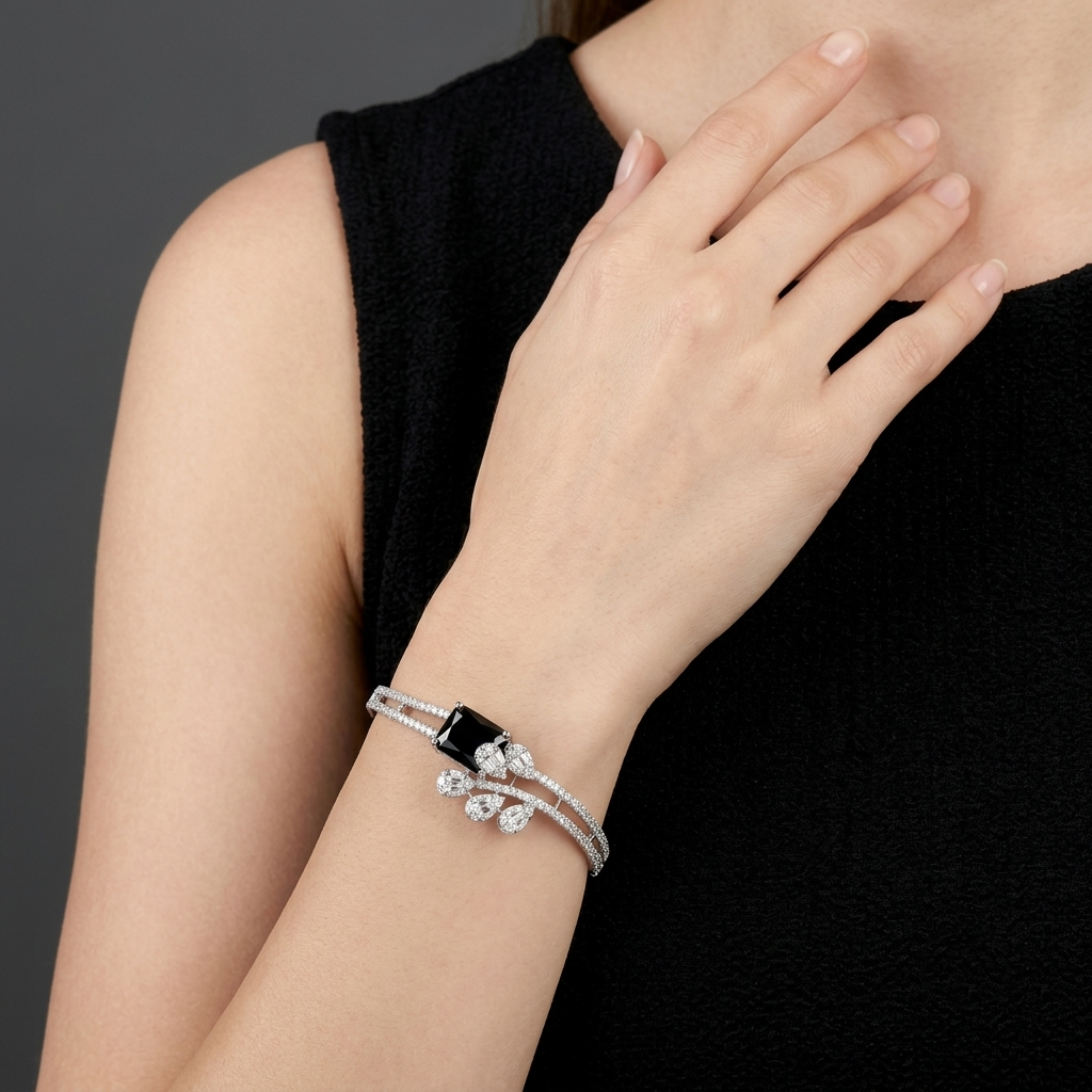 Velmora AD Sparkling Black Bracelet with premium black center stone and sparkling American Diamond AD detailing, silver-tone designer bracelet for women by ENAVA.