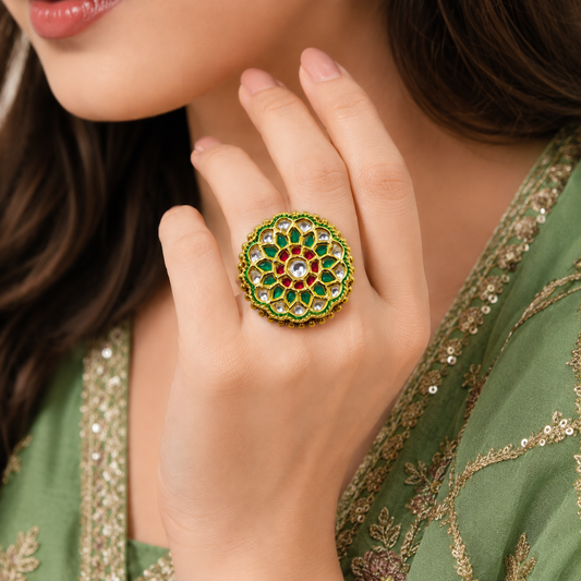 Vrinda Ethnic & Traditional Kundan Ring by Enava featuring white kundan stones, green enamel petals, ruby-pink accents, and gold plating in a floral statement design for ethnic, festive, and wedding wear.
