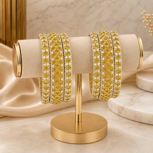 Sitara Yellow Festive Bangle Set with 2 kada bangles and 4 side bangles featuring yellow detailing, golden latticework and sparkling stones by ENAVA